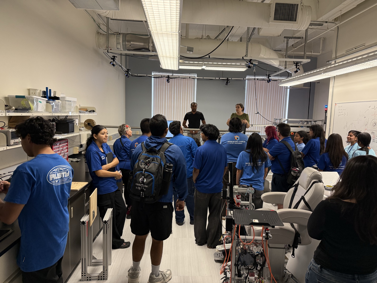 AISS Summer Academy students on a tour of the lab